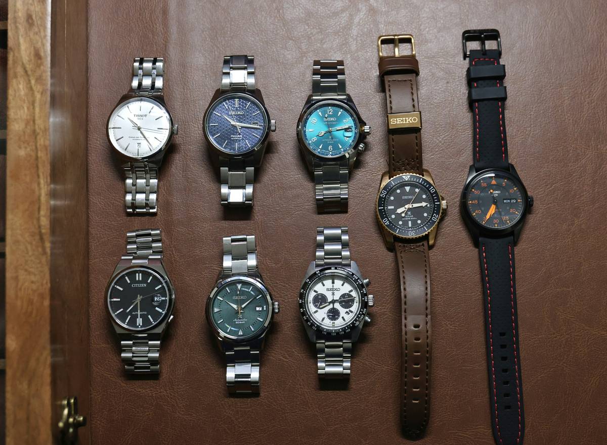 Collaborative Designer Drops featuring luxury watch face with tech integration and designer branding